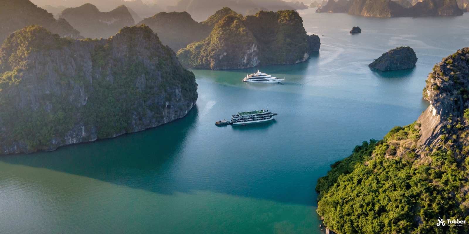 Luxury yachts in Pang Nga Bay, iconic limestone cliffs and serene waters