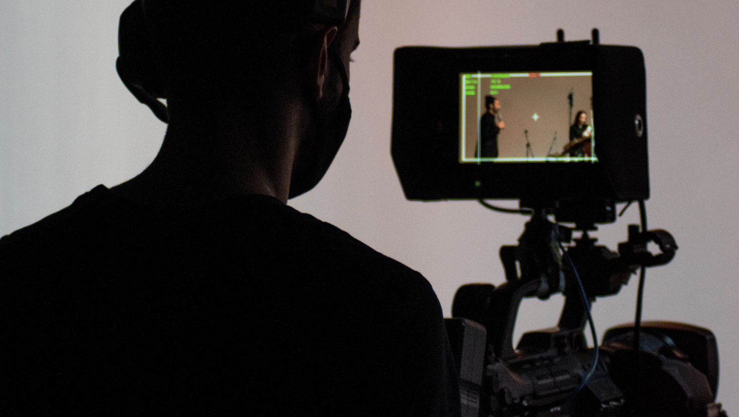 man filming